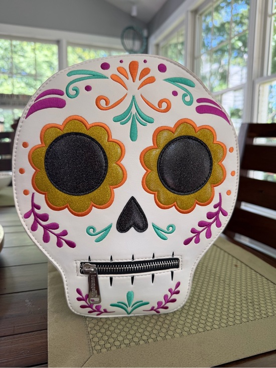 Loungefly Handbags - Loungefly exclusive Disney Parks Coco White Floral Sugar Skull Backpack Bag